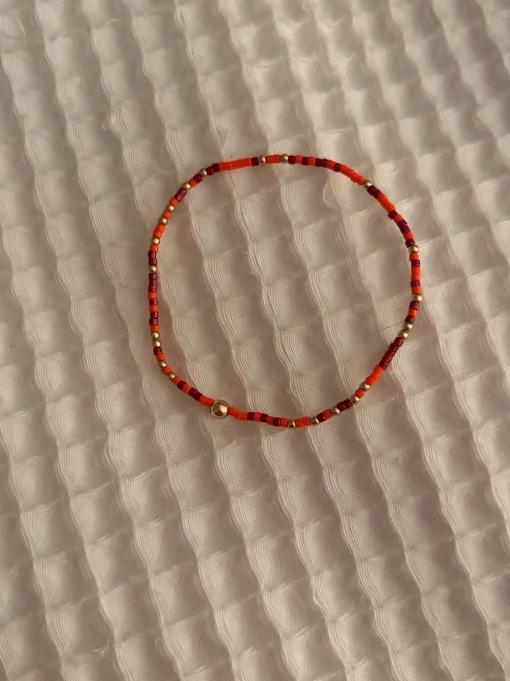 Maroon and orange enewton bracelet